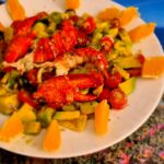 Astice, mango e cipolla rossa di tropea: un'insalata alla portata di tutti